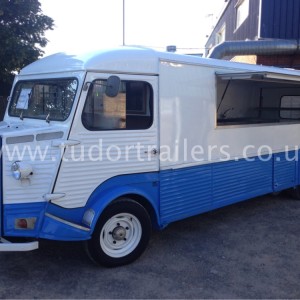 Blue and White H Van with open hatch
