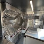 Interior of Burger Box Van Conversion with high end cooking appliances