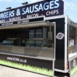 Showman mobile catering trailer with twin hatches