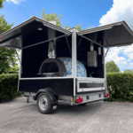 Compact catering trailer with pizza oven